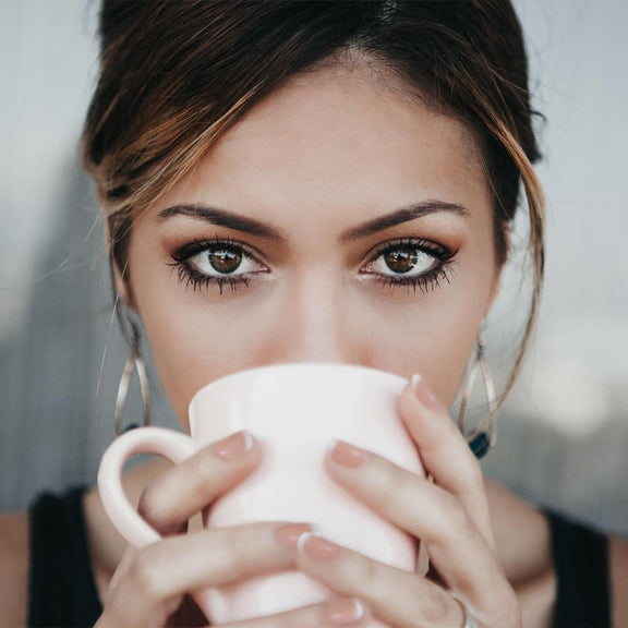 lady-drinking artisan-coffee