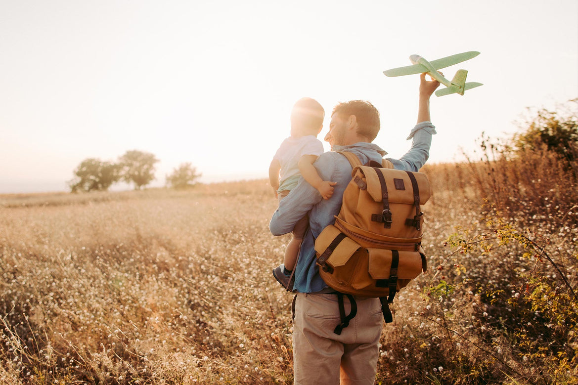 man with child and toy aeroplane fathers day gift ideas bespoke coffee boxes