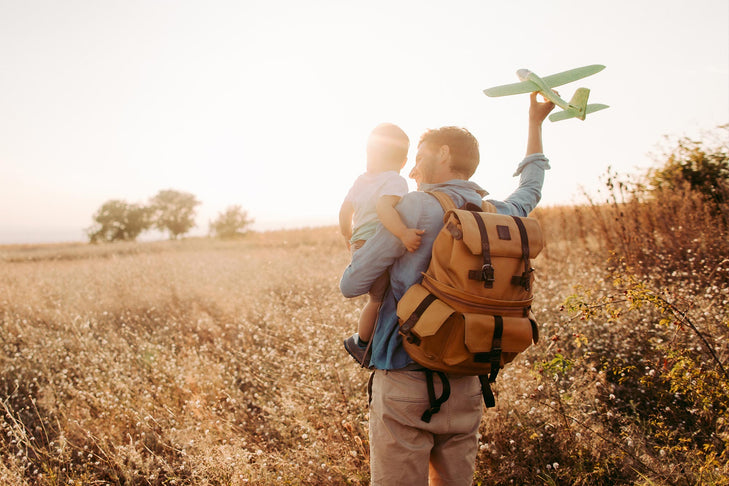 man with child and toy aeroplane fathers day gift ideas bespoke coffee boxes