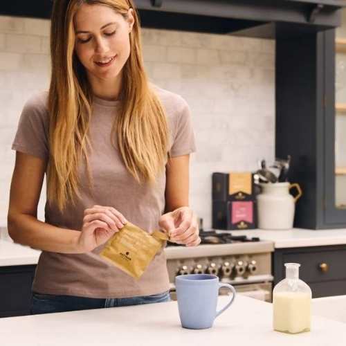 A woman making the smart cookie coffee bag
